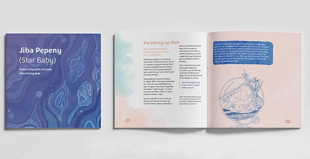open book with blue and pink pages